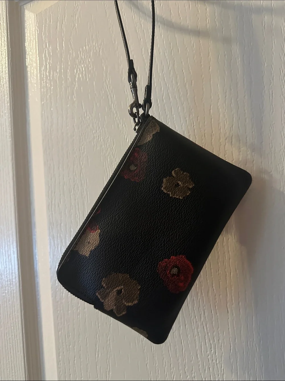 Coach Black Floral Zip Wristlet with Floral Red and Tan Accents